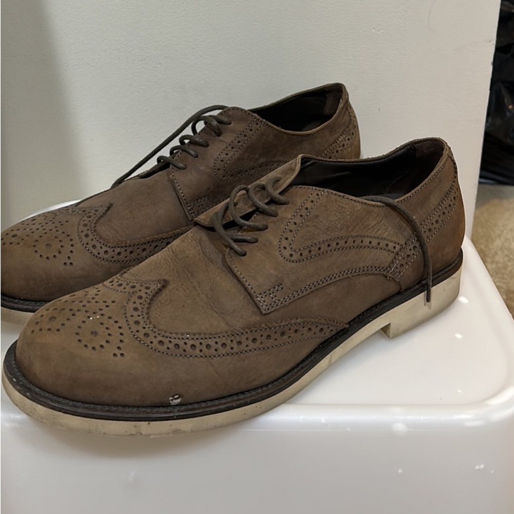 Tod’s dress shoes. Worn 5 times or less in great condition.